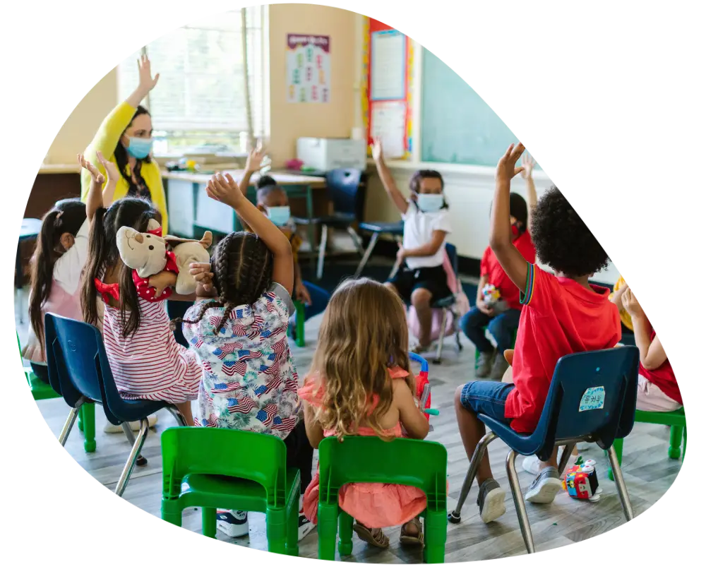 New Project children raising their hands