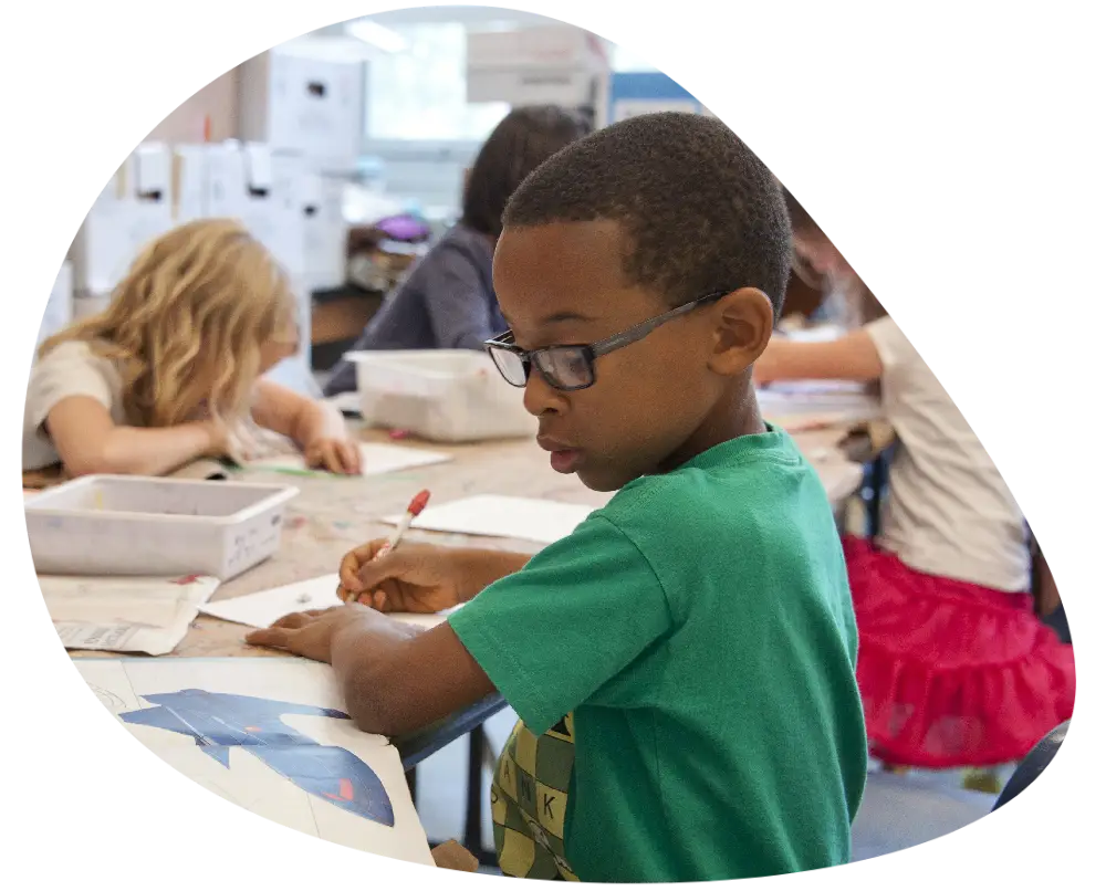 a kid studying a kid studying