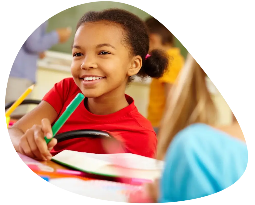 a kid wearing red shirt smiling a kid wearing red shirt smiling